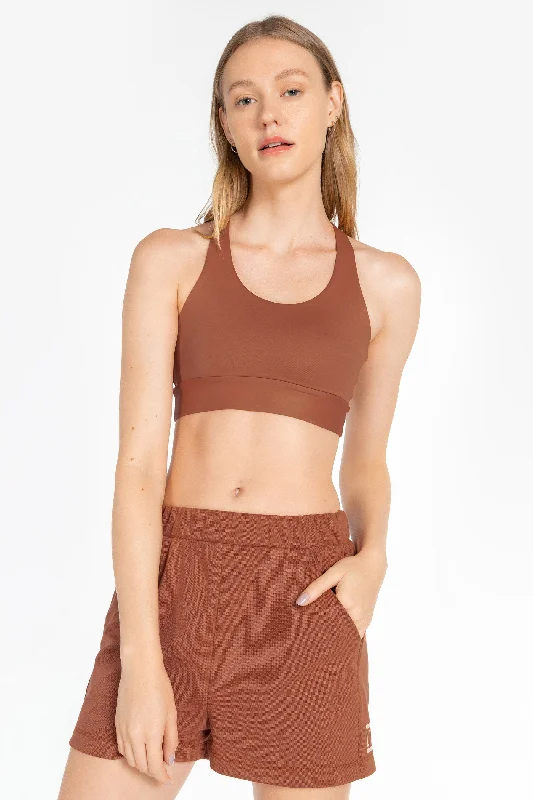 padded wireless bras for light supportEssential Sense Mid Racer Sports Bra